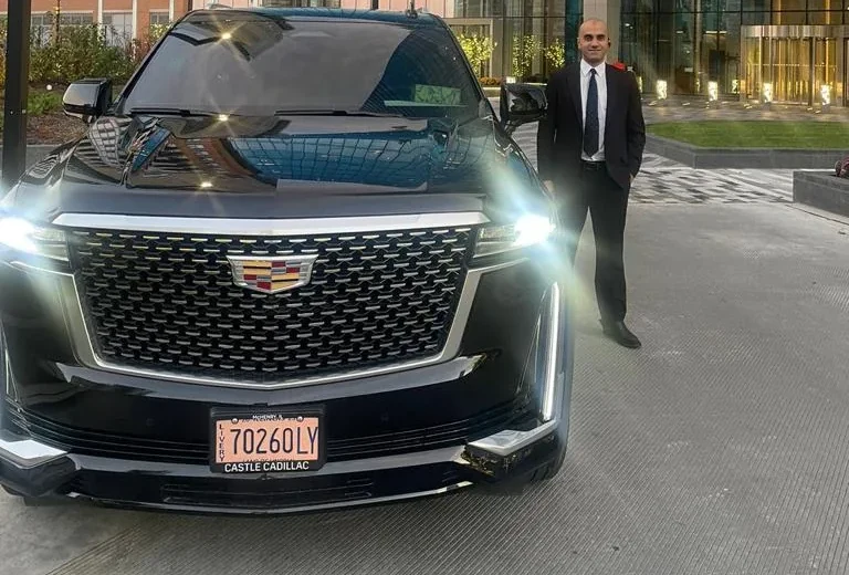 Cadillac Escalade ESV with chauffeur at the St. Regis Chicago - Monarch Fleet Chicago